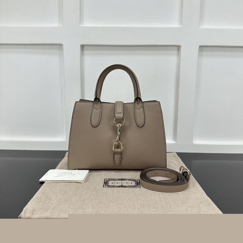 G*u*i shopping bags